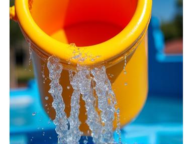 Close-up of a large tipping bucket on an aquatic structure